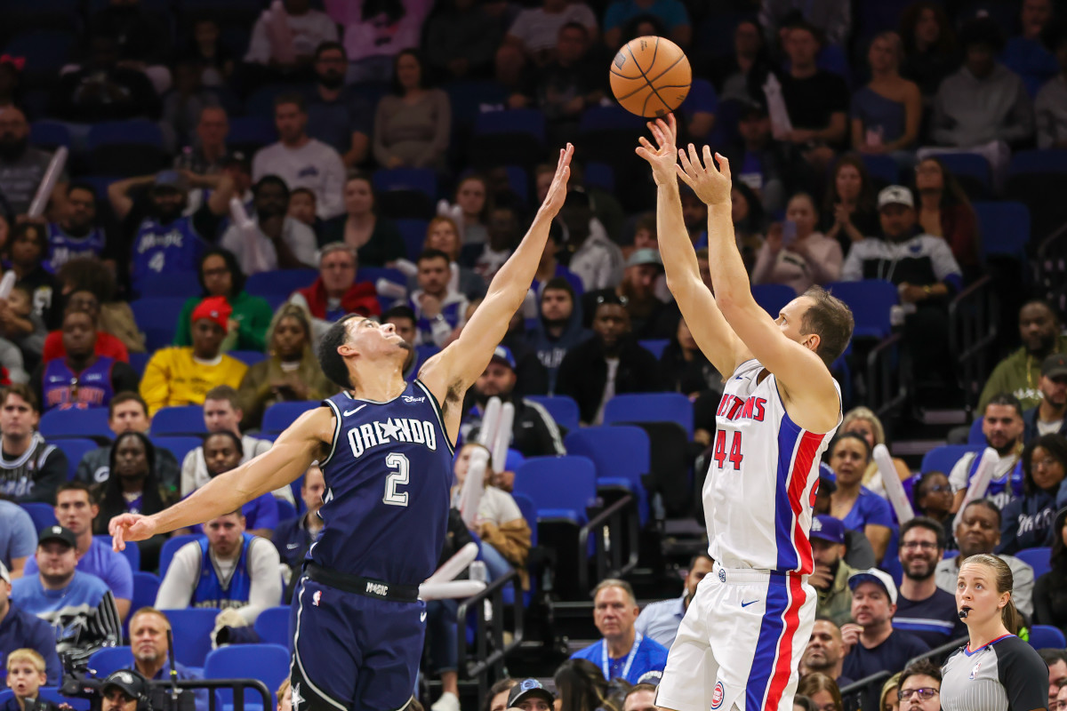 Detroit Pistons forward Bojan Bogdanovic (44) shoots the ball over Orlando Magic guard Caleb Houstan (2) during the second quarter at Amway Center.